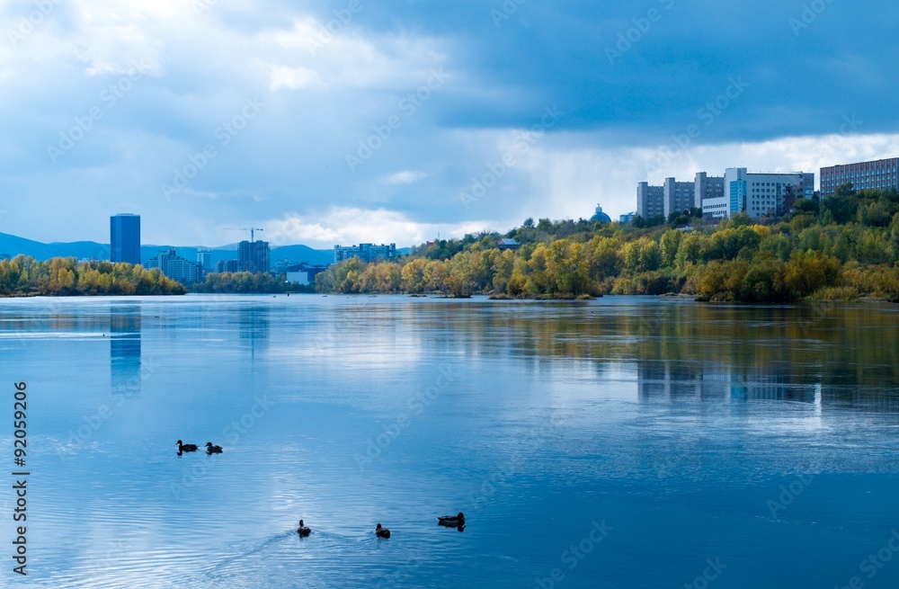 Fototapeta premium Calm urban landscape. Tranquil autumn city landscape before the rain