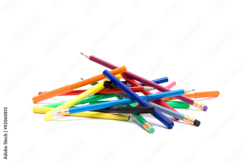 a bunch of pencils and felt-tip pens on a white background a bunch of pencils and felt-tip pens on a white background