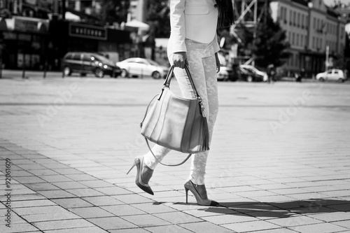 Business woman holding a bag