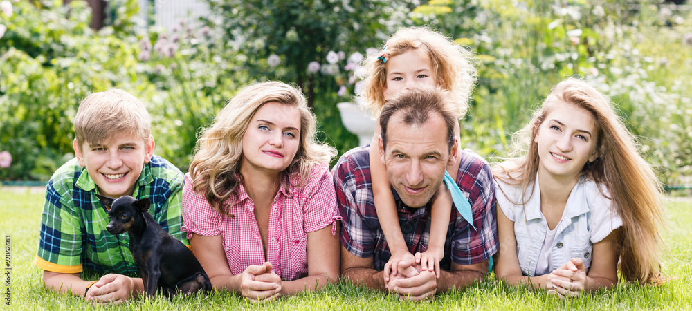 Happy family having weekend in summer park StockFoto Adobe Stock