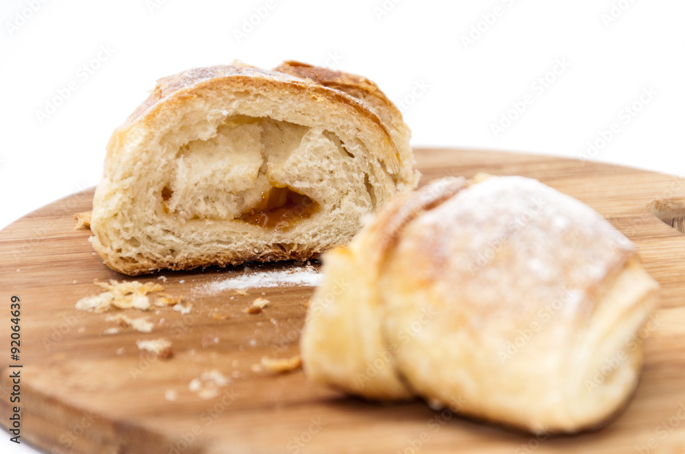 Piece of puff pastry on the wooden board Piece of puff pastry on the wooden board