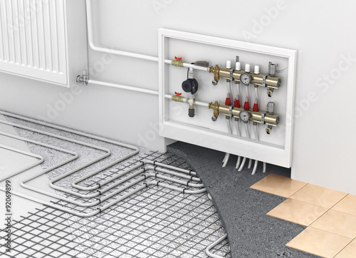 Slika na platnu Underfloor heating with collector and radiator in the room. Conc
