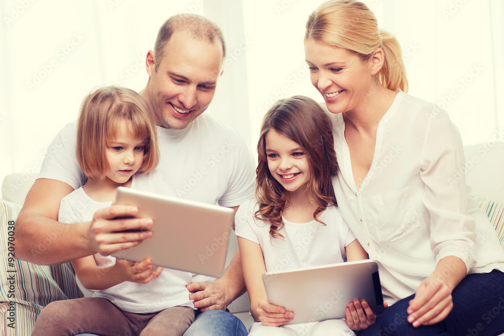 family and two kids with tablet pc computers family and two kids with tablet pc computers