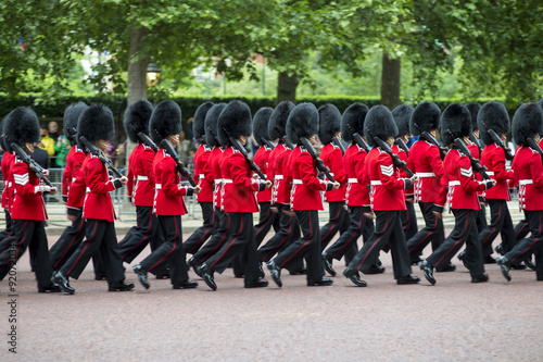 Photography Queen's foot guards marching in formation down The Mall in a royal Trooping the