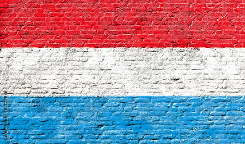 Luxembourg - National flag on Brick wall
