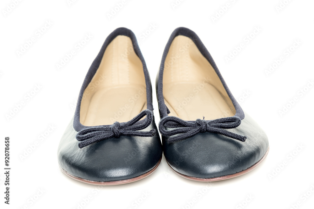 Pair of female shoes over white background front view Pair of female shoes over white background front view