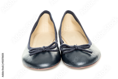 Pair of female shoes over white background front view