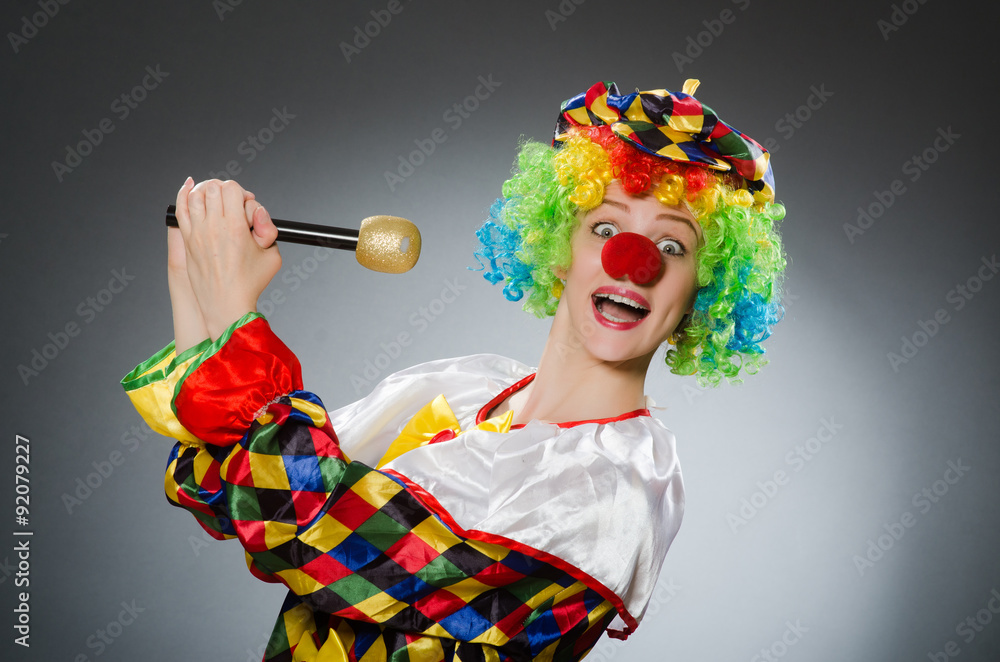 Clown with mic in funny concept Clown with mic in funny concept