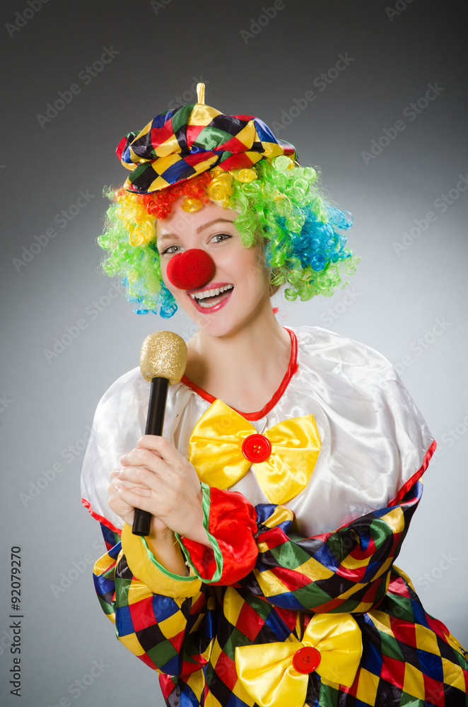 Clown with mic in funny concept Clown with mic in funny concept