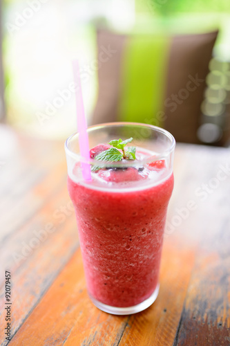 Mixberry smoothies on wood table