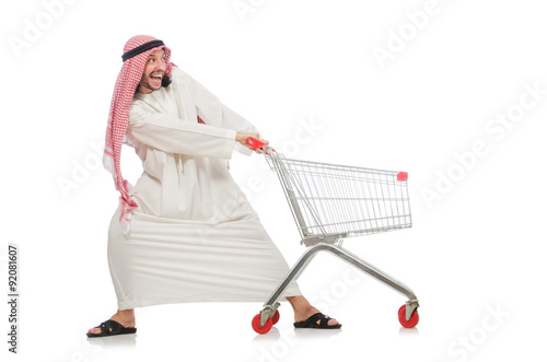 Arab man doing shopping isolated on white © Elnur