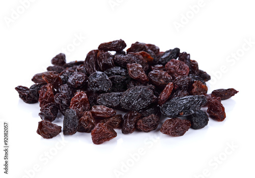 Dried raisins on a white background