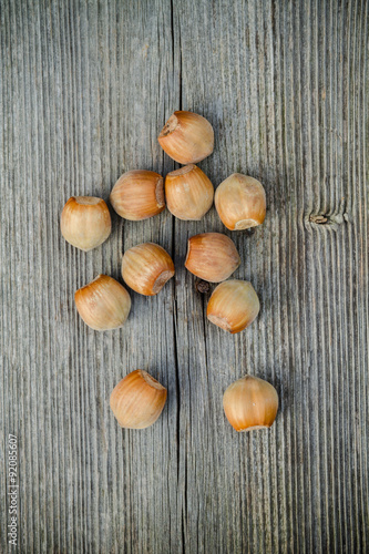 nuts on old wooden background