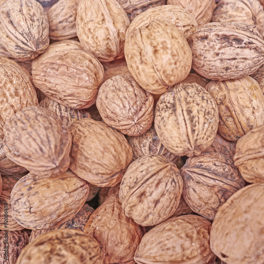 organic walnuts close up, vegan food background organic walnuts close up, vegan food background