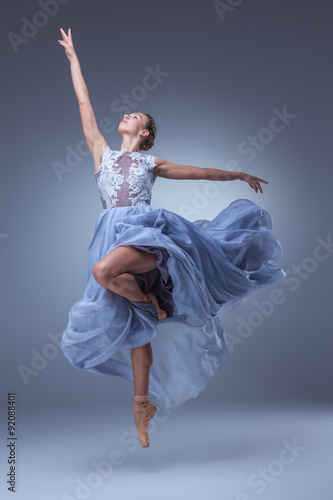 Tela The beautiful ballerina dancing in blue long dress
