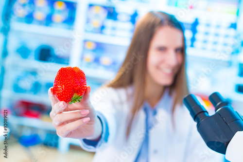 checking food Strawberries, on the content herbicides and pestic photo