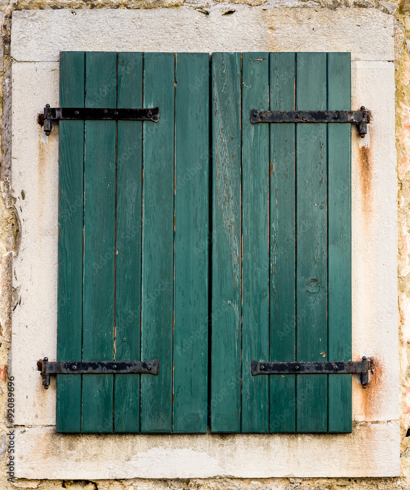 old window with shutters