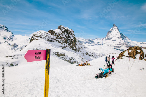 Directional sign post with the background of Matterhorn.