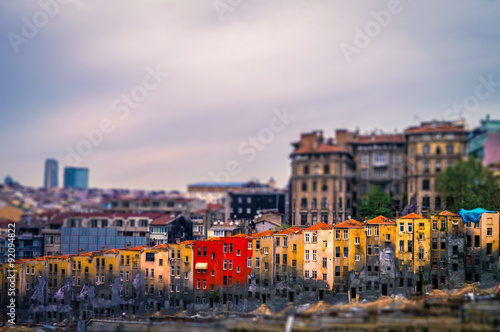 Photography Tilt shift effect view of colorful run down houses