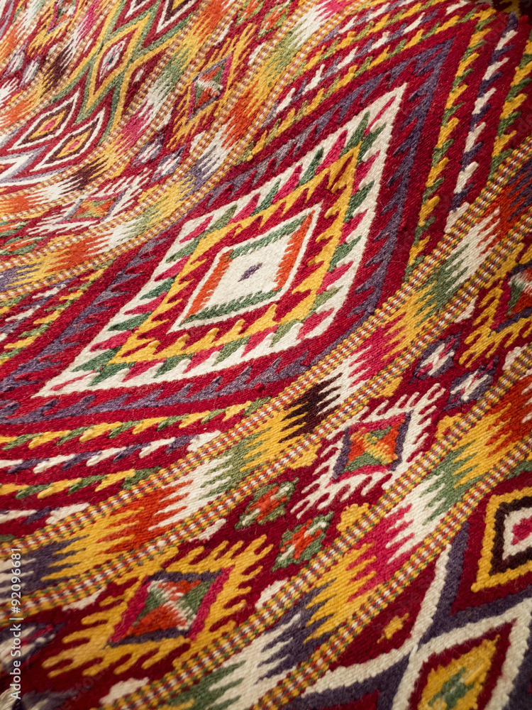 Close up of handmade traditional wool rug Close up of handmade traditional wool rug