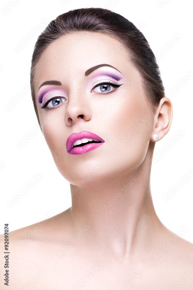 Portrait of fashion woman with a bright make-up
