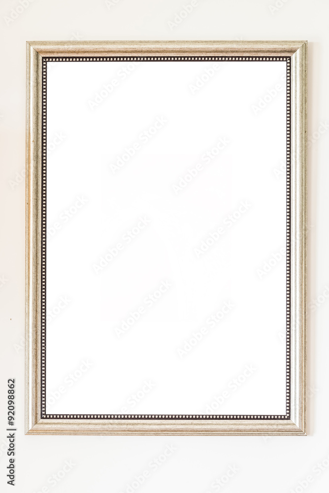 Blank frame on white wall background Blank frame on white wall background
