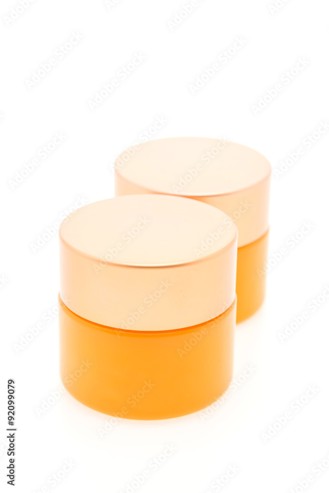Blank orange cosmetic bottle cream isolated on white background Blank orange cosmetic bottle cream isolated on white background