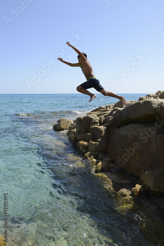 Boy dive into the sea