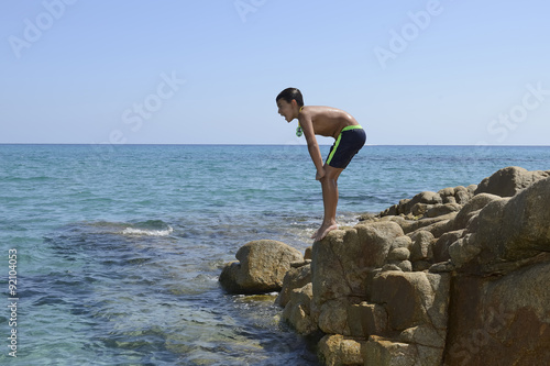 Boy dive into the sea