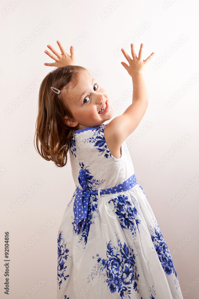 Little girl turned towards the wall Little girl turned towards the wall