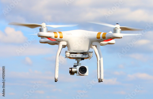 Drone quadrocopter with high resolution digital camera. New tool for aerial photo and video. 