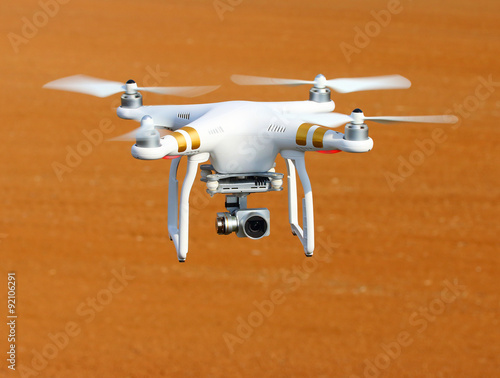 Drone quadrocopter with high resolution digital camera. New tool for aerial photo and video. 
