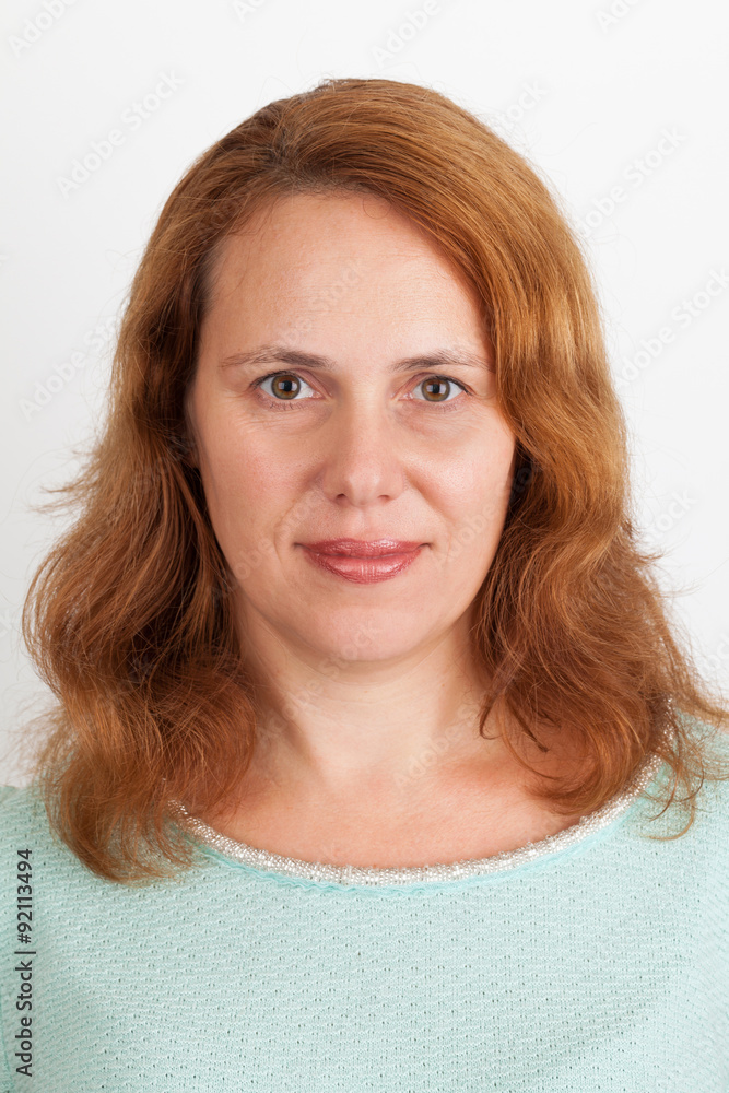 Young positive Caucasian woman, closeup portrait