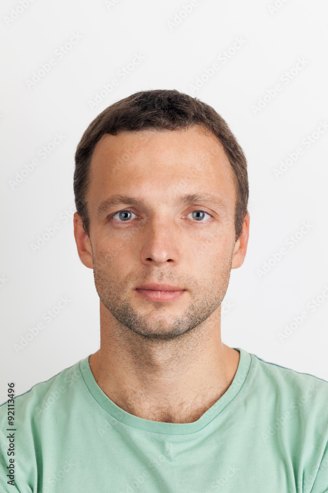 Young serious Caucasian man in casual clothing Young serious Caucasian man in casual clothing