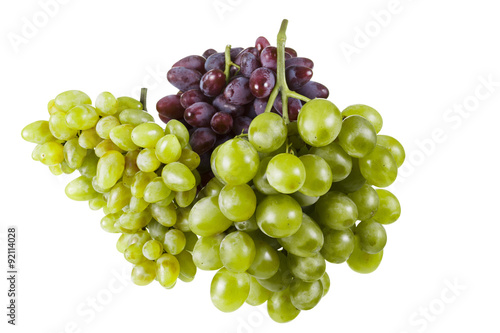 Several varieties of ripe grapes on a white background