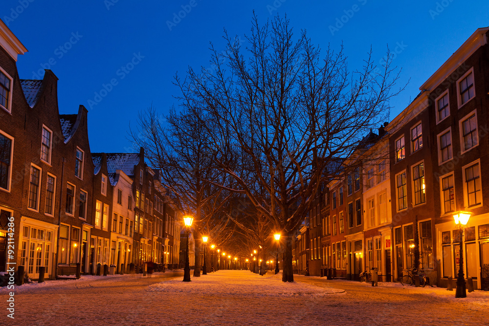 Hooglandsekerkgracht in Leiden at twilight in winter with snow