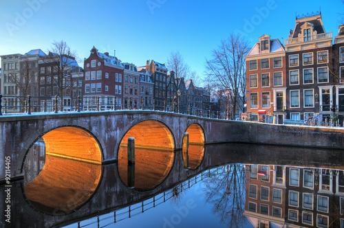 Beautiful early morning winter view on one of the Unesco world heritage city canals of Amsterdam, The Netherlands. HDR  #92114405