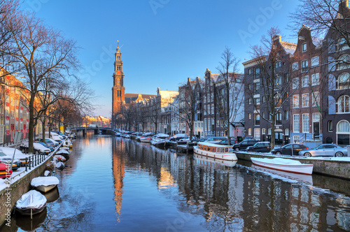 Canvas Print Beautiful early morning winter view on the Westerkerk and the Prinsengracht, one of the Unesco world heritage city canals of Amsterdam, The Netherlands