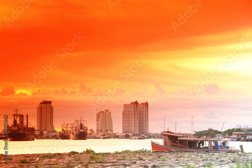 Sunset Wood Boat across the Chao Phraya River