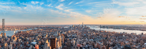 Panorama New York City skyscrapers at sunset.