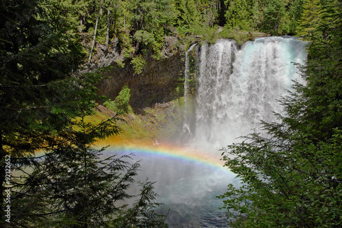 Rainbow at Koosah Falls on the McKenzie river in the central western Oregon Cascade range mountains