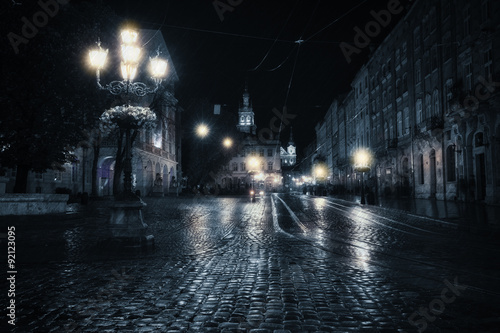 Old European city at rainy night © Nickolay Khoroshkov