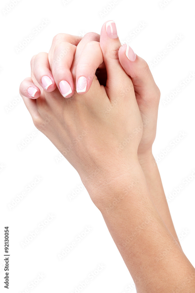 Well-groomed female hands, isolated on white background