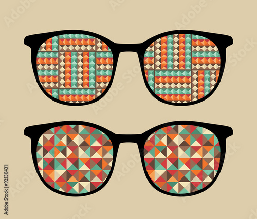 Retro sunglasses with reflection in it.