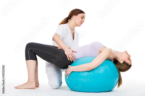 doctor with medical ball and woman patient