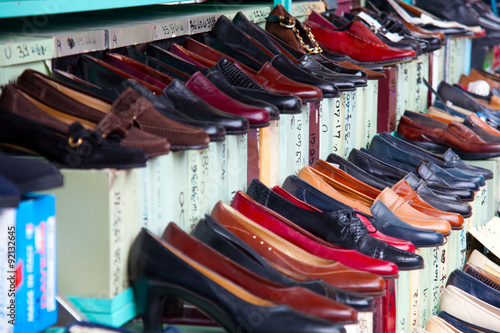 Shoes for sale in an outdoor market
