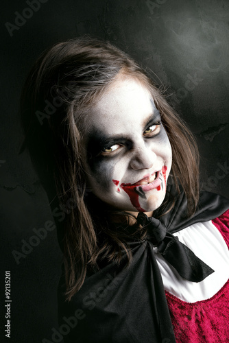 Girl in Halloween vampire costume
