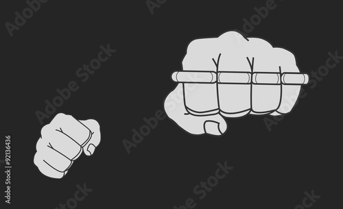 Clenched striking man fists holding brass-knuckle. Chalk