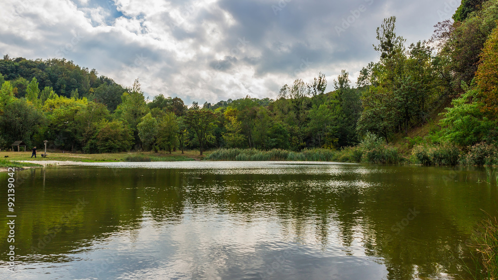 Amazing colorful landscape with lake and park, early fall, Lviv, Ukraine