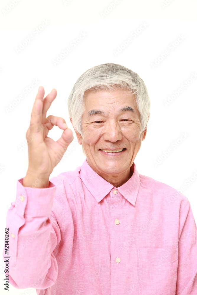 senior Japanese man showing perfect sign senior Japanese man showing perfect sign